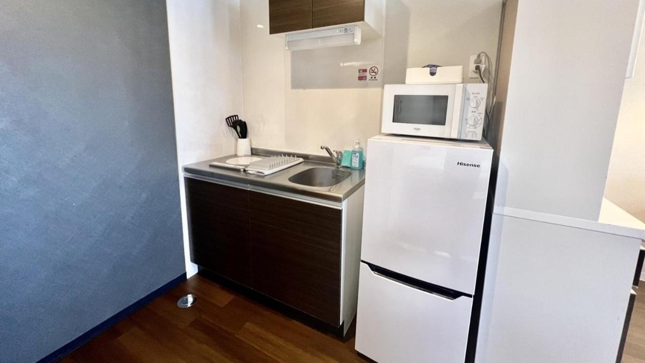 Apartment Hotel Ecott Kagoshima Extérieur photo